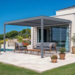 Pergola bioclimatique adossée PIANA 4x3m aluminium gris - Lames orientables